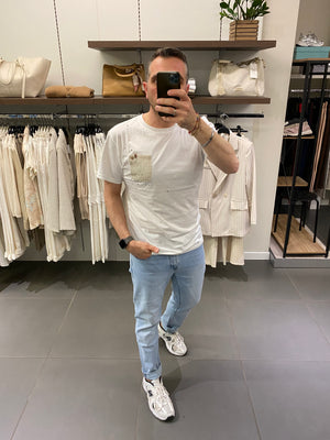 T-SHIRT in cotone con TASCHINO