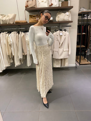 Gonna svasata in pizzo beige